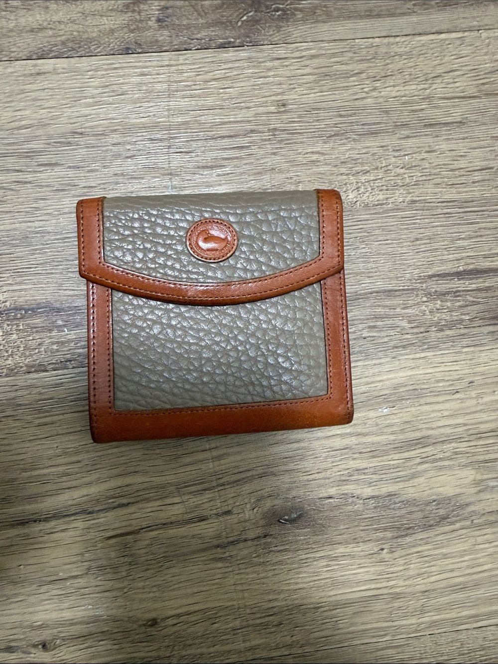 Dooney & Bourke Taupe Pebbled Leather Wallet with Brown Trim